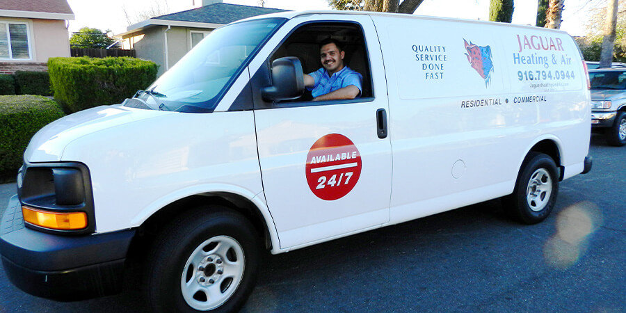 Service technician driving to client's house